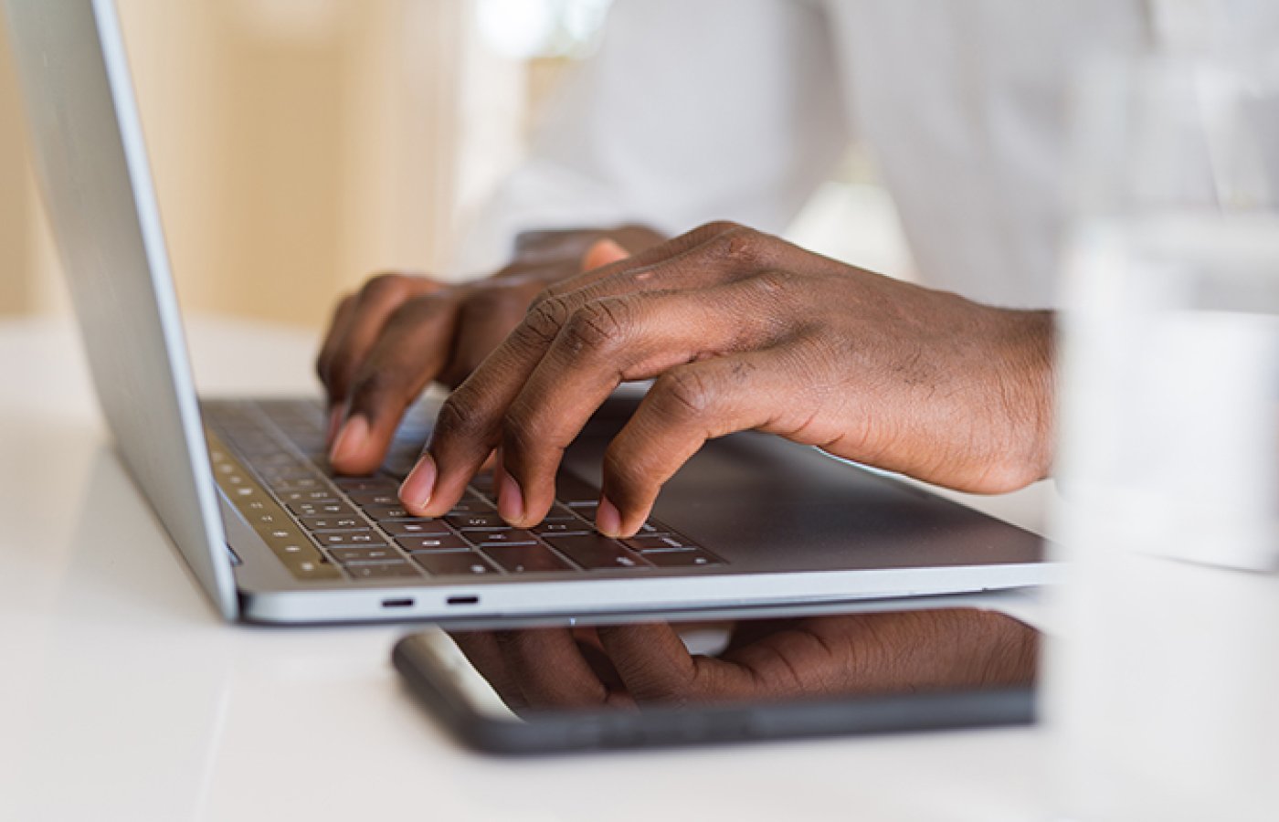 hands on computer keyboard