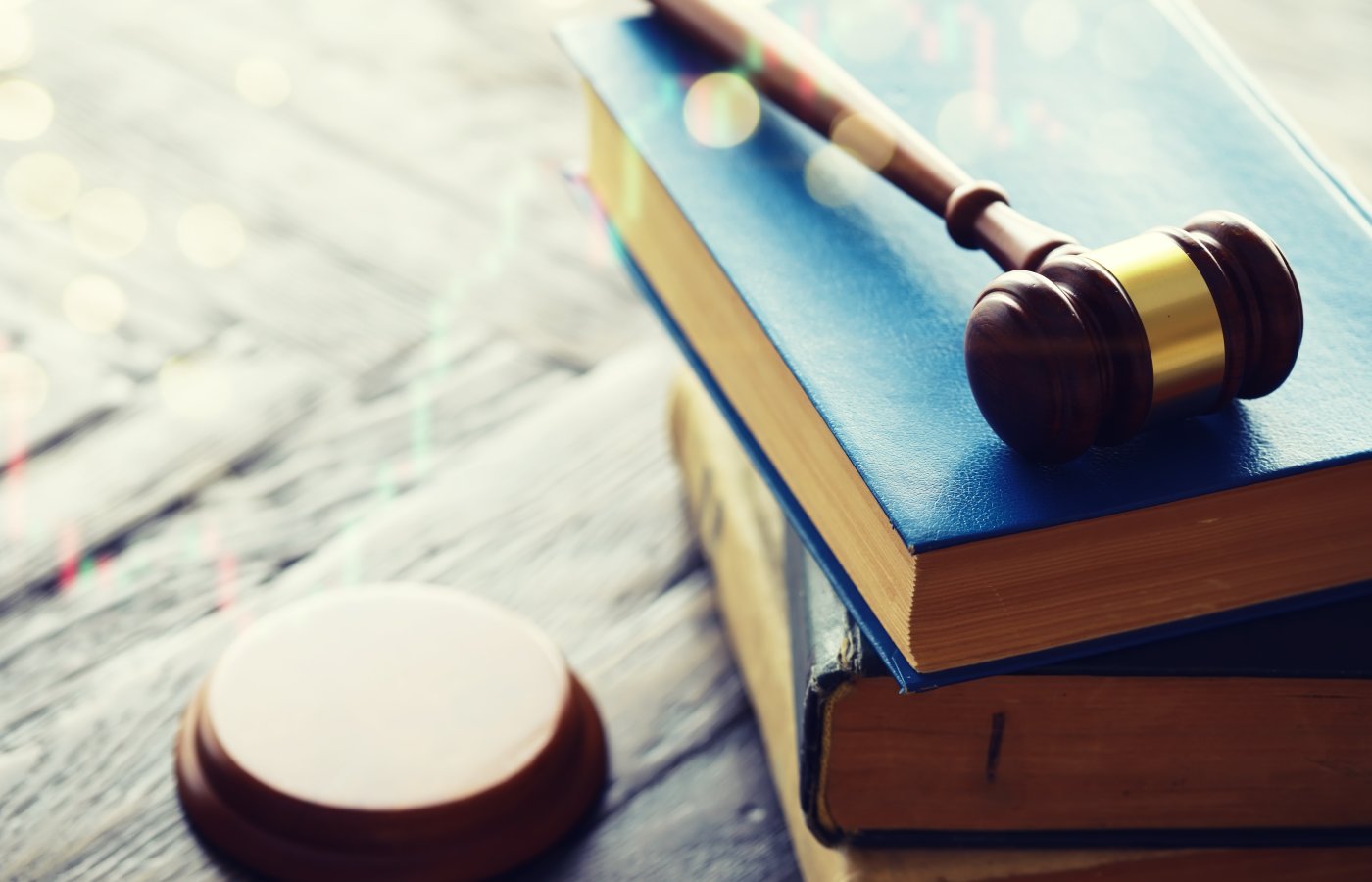Gavel on top of stack of books