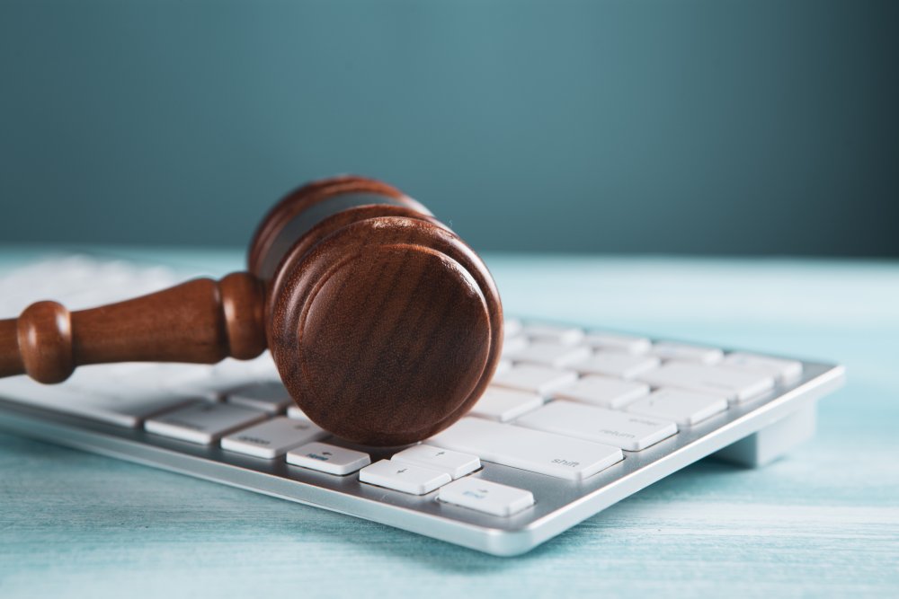 gavel on computer keyboard
