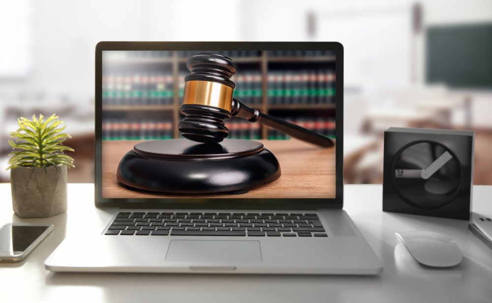 image of gavel on laptop computer